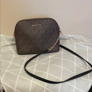 Michael Kors Dark Brown Logo Dome Crossbody bag.
